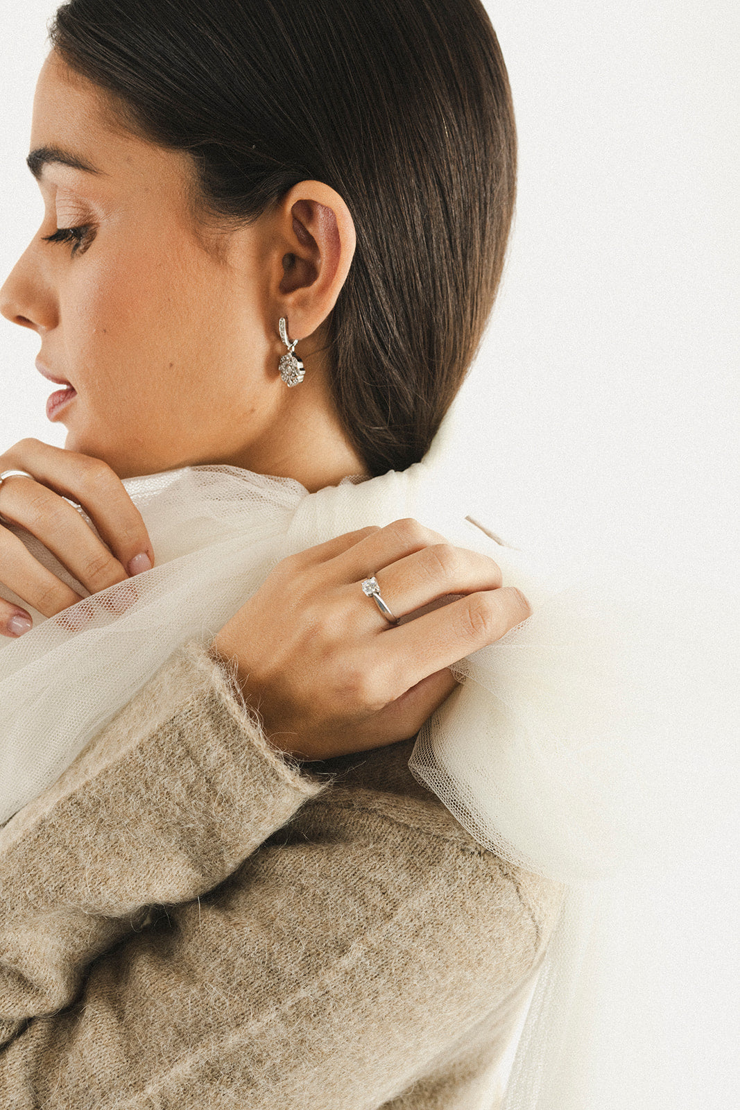 Solitario 4 garras con diamante y oro blanco de 18 Kilates