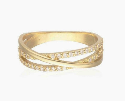 Anillo cruzado oro amarillo 18 K y  diamantes