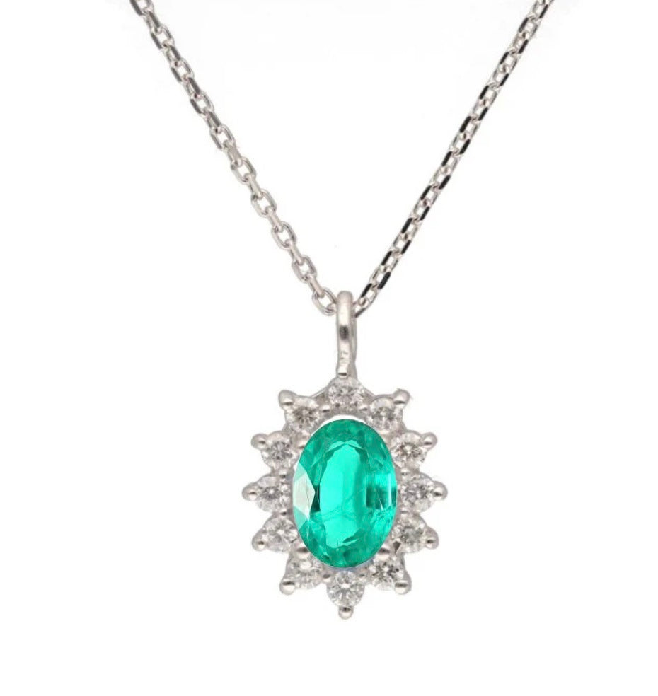 Colgante orla diamantes y piedra de color