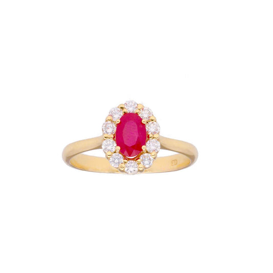 Anillo orla diamantes con  rubí en oro de 18 Kilates