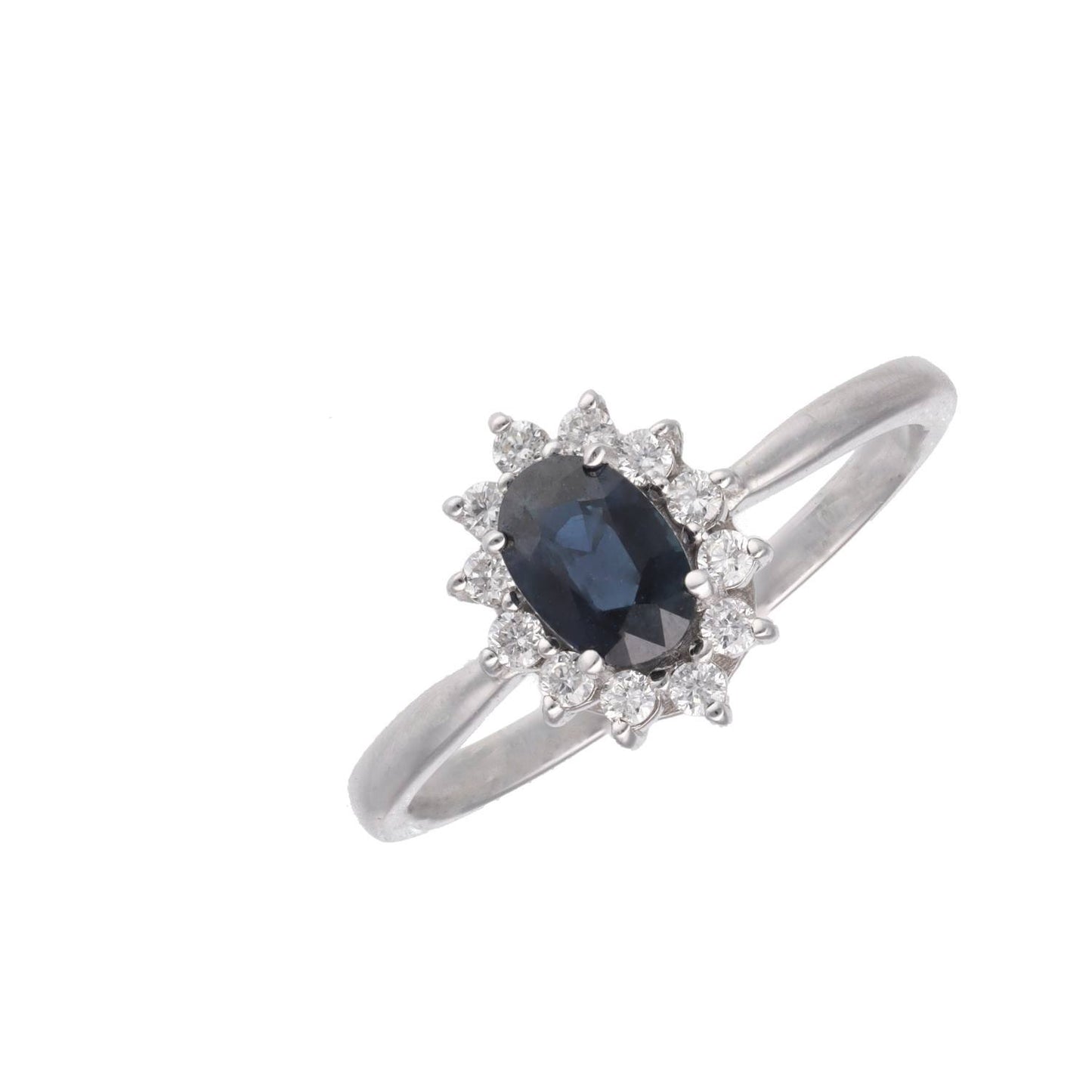 Anillo orla con piedra central de color y diamantes en oro de 18 K